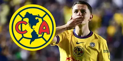 Álvaro Fidalgo junto al escudo del América / FOTO EXCÉLSIOR