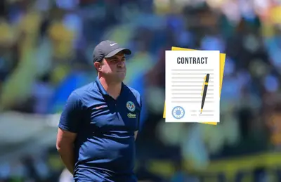 André Jardine usando gorra y a su lado un contrato animado/Foto Fútbol Total.