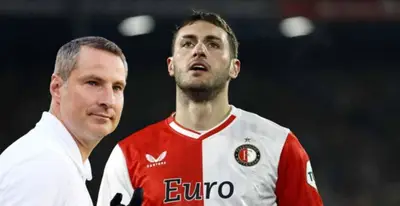 Brian Priske junto a Santiago Giménez / FOTO GETTY IMAGES