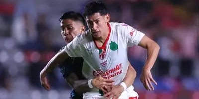 Jugadores en partido. Foto. Chivas