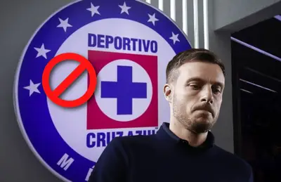 Martín Anselmi volteando hacia abajo y logo de prohibición en rojo/Foto Récord.