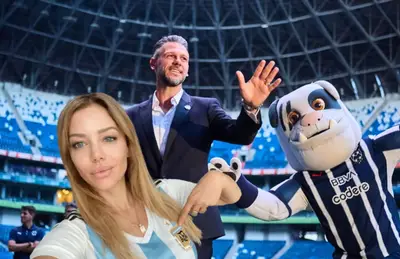 Martín Demichelis saludando y Evengelina Anderson/Foto Plano Informativo.