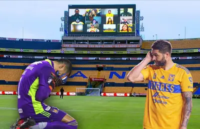 Nahuel Guzmán hincado llorando y a su lado André Pierre Gignac.