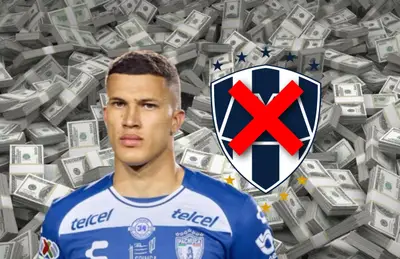 Nelson Deossa y escudo de Monterrey con cruz en medio/Foto Atomix.