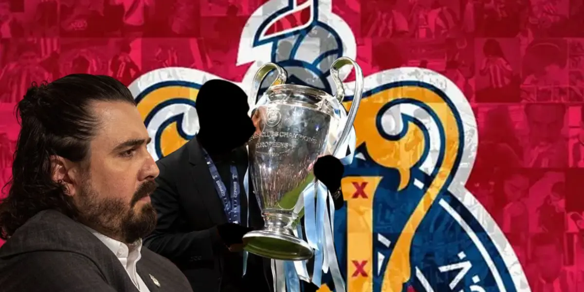 Amaury Vergara junto a DT incógnito levantando la Champions League / FOTO MEXSPORT