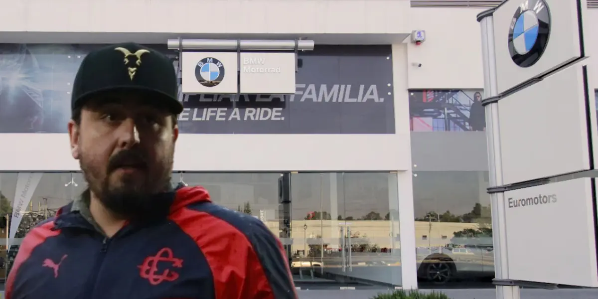 Amaury Vergara y agencia de autos de fondo/ Foto BMW Motorrad.