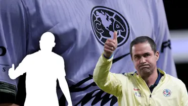 André Jardine con el puño arriba y silueta haciendo lo mismo/ Foto Wikinature.