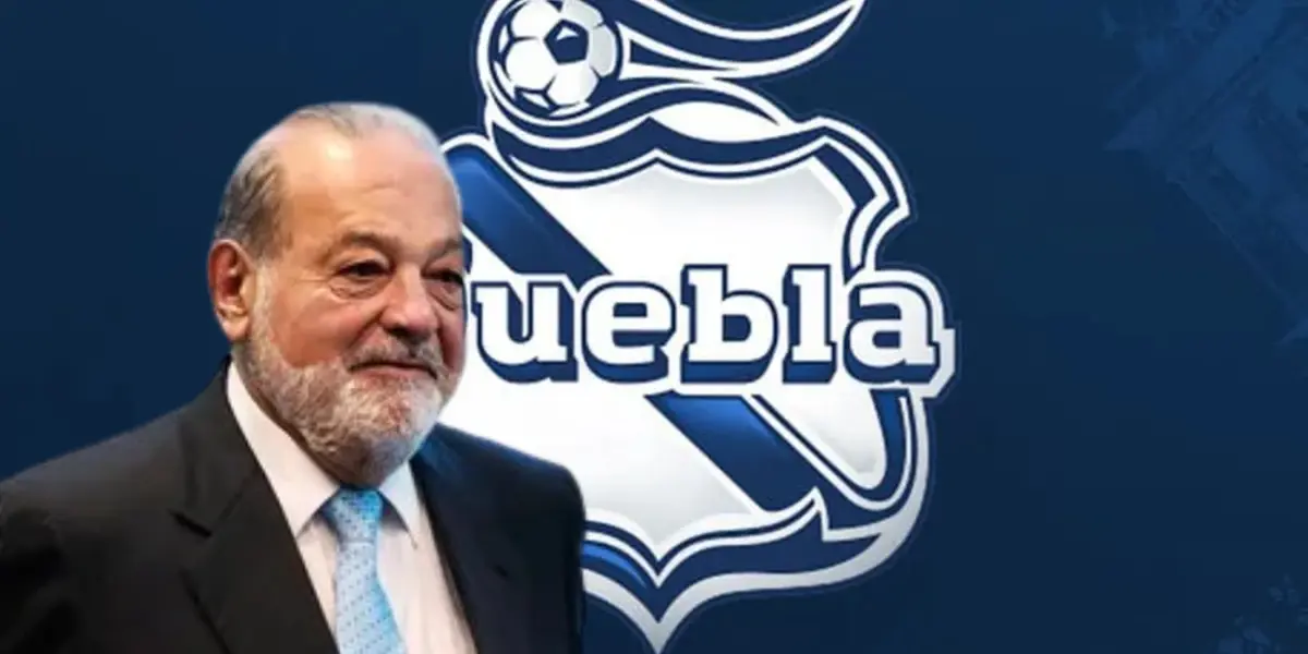 Carlos Slim junto al escudo del Club Puebla / FOTO X