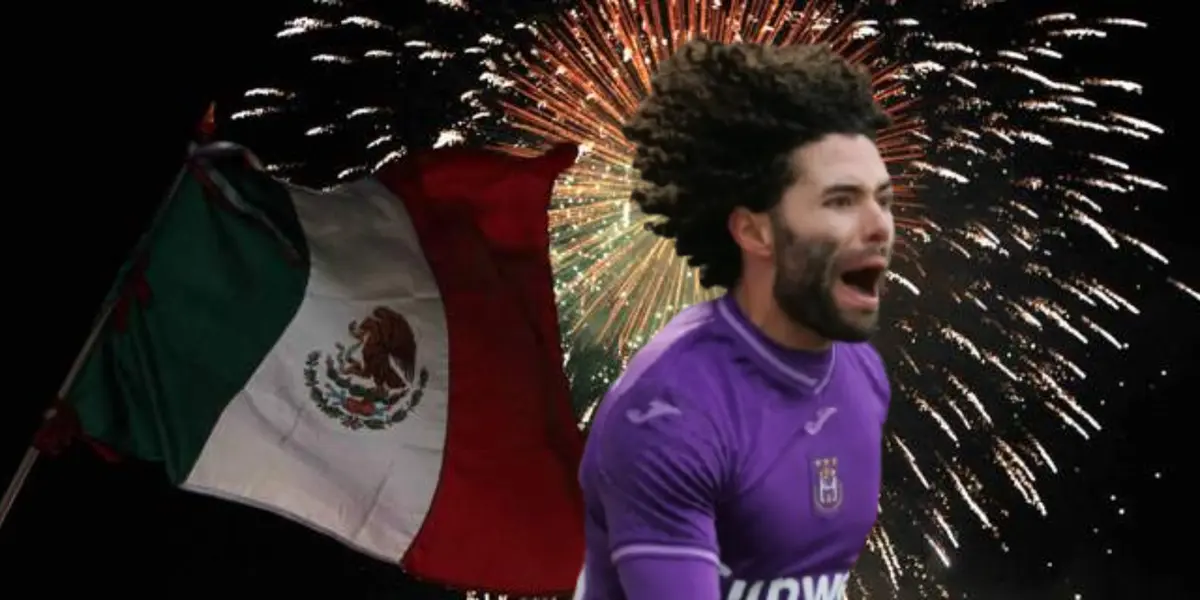 César Huerta junto a la bandera de México / FOTO GOAL
