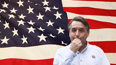 Emilio Azcárraga serio y bandera de Estados Unidos/Foto Pexels.