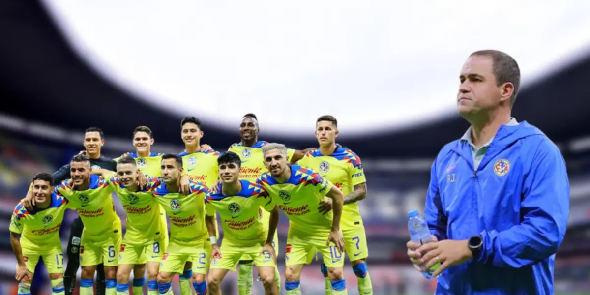 Jugadores del América posando y André Jardine sosteniendo una botella.
