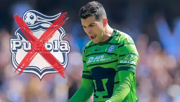 Julio González junto al escudo del Puebla / FOTO FÚTBOL TOTAL