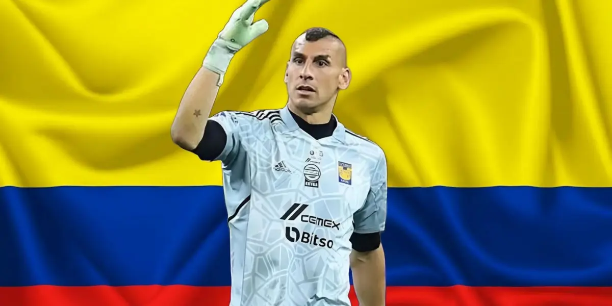 Nahuel en un partido de Tigres y al fondo la bandera de Colombia / Foto Mexsport