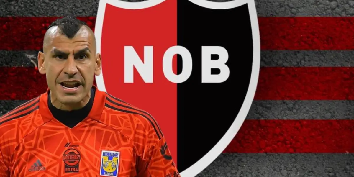Nahuel Guzmán junto al escudo de Newell's Old Boys / FOTO MARCA