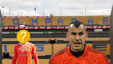 Nahuel Guzmán serio y a su lado otro portero con el rostro tapado/ Foto Tigres.